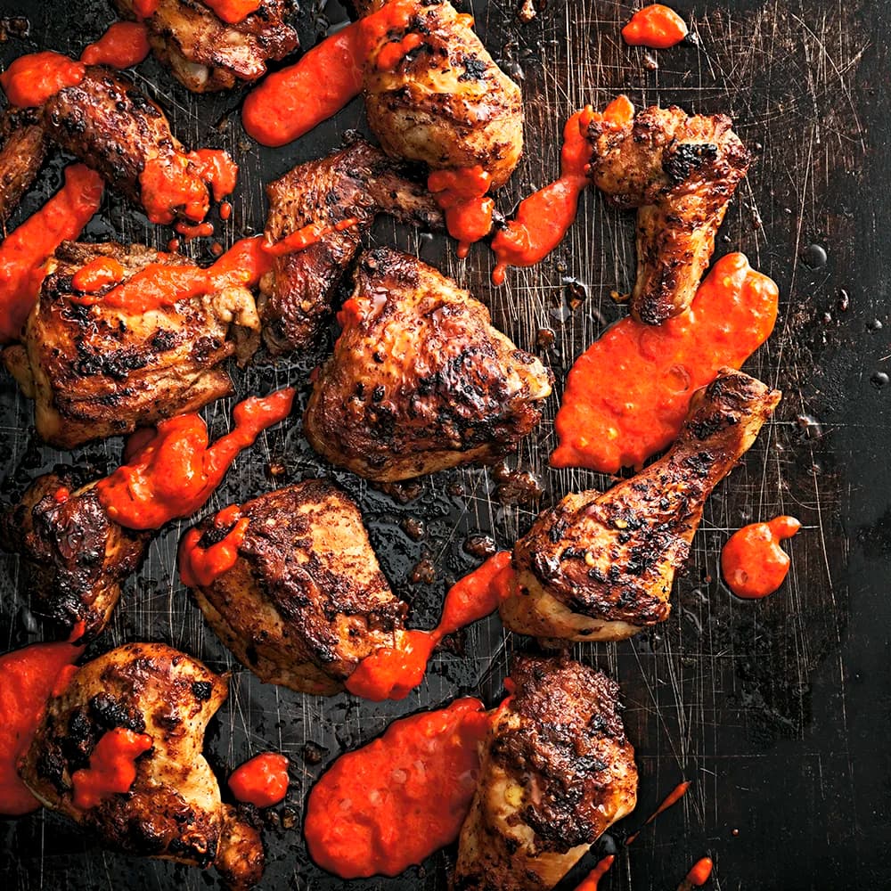 Jerk chicken med het paprika- och chilisås